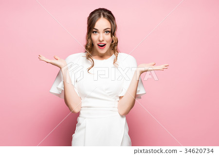 Surprised happy beautiful woman looking sideways 34620734