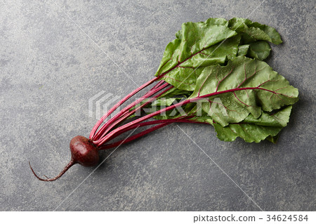 Fresh harvested beetroot on stone background 34624584