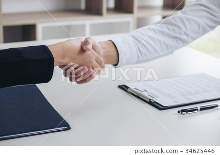 greeting new colleagues, Handshake while job interviewing, male 34625446