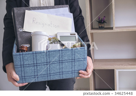 business woman carrying packing up all his personal belongings a 34625448