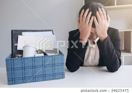 Images of packing up all her personal belongings and files into 34625475