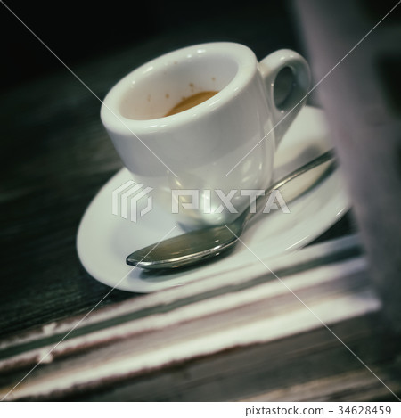 Small cup of Italian espresso Small cup of Italian espresso 34628459