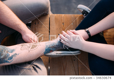Sensitive romantic bound. Couple holding hands 34630674