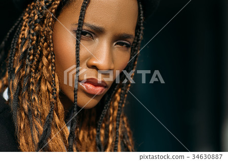 Sad African American woman. Distrustful emotion Sad African American woman. Distrustful emotion 34630887