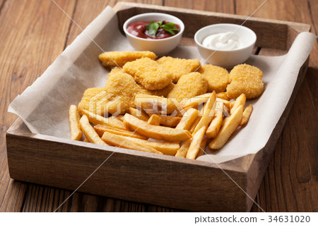 Chicken nuggets and french fries Chicken nuggets and french fries 34631020