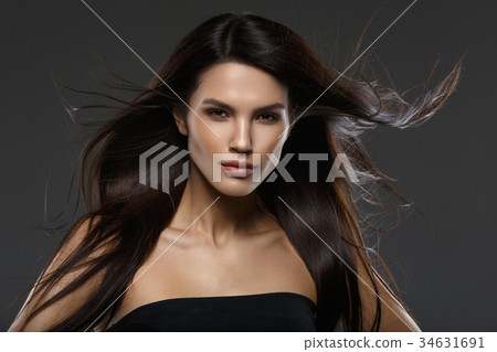 beautiful girl with long flying hair beautiful girl with long flying hair 34631691