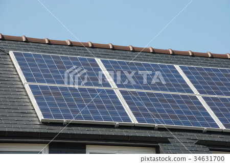 House with solar panels on roof House with solar panels on roof 34631700