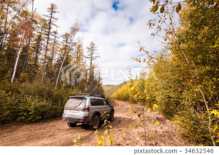 SUV on a forest road 34632546