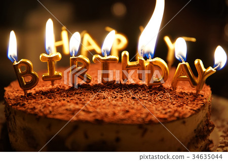 happy birthday candle with fire on a cake happy birthday candle with fire on a cake 34635044