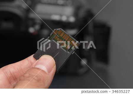 hand hold SD card uhs ii against the camera hand hold SD card uhs ii against the camera 34635227