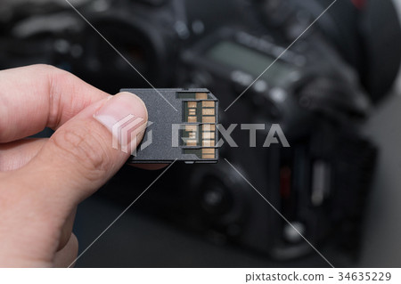 hand hold SD card uhs ii against the camera hand hold SD card uhs ii against the camera 34635229
