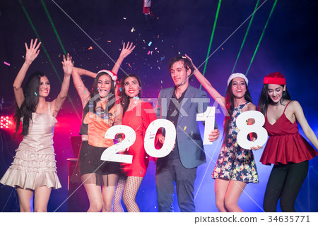 Young people are celebrating the night party entertainment. 34635771