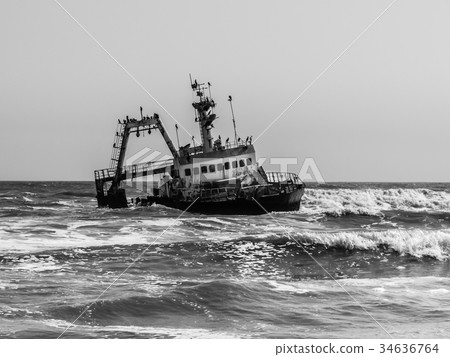 Shipwreck on Skeleton Coast in Namibia Shipwreck on Skeleton Coast in Namibia 34636764