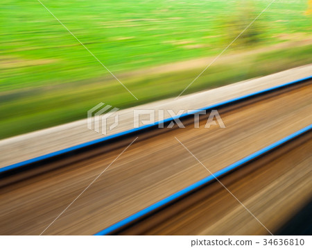 Blurred railroad 34636810