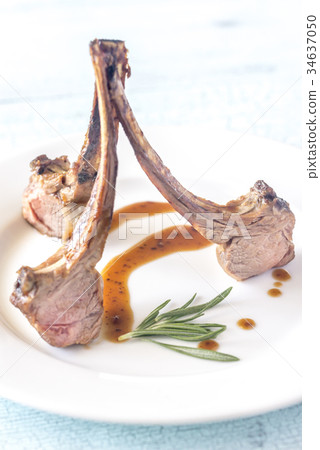 Grilled lamb rib chops on the plate 34637050