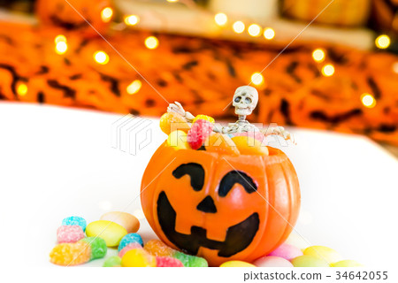 Halloween pumpkin, trick or treat with sweet candy 34642055