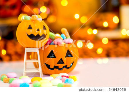 Halloween pumpkin, trick or treat with sweet candy Halloween pumpkin, trick or treat with sweet candy 34642056