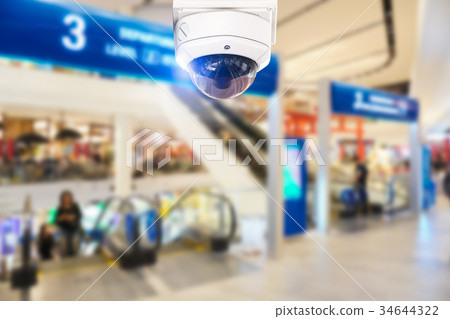 CCTV security camera shopping mall on background. CCTV security camera shopping mall on background. 34644322