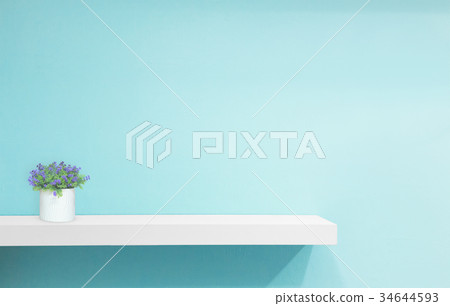 Retail shelf on light blue vintage background. Retail shelf on light blue vintage background. 34644593