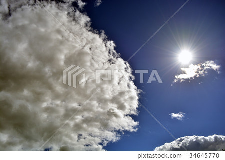 sun and clouds on blue sky sun and clouds on blue sky 34645770