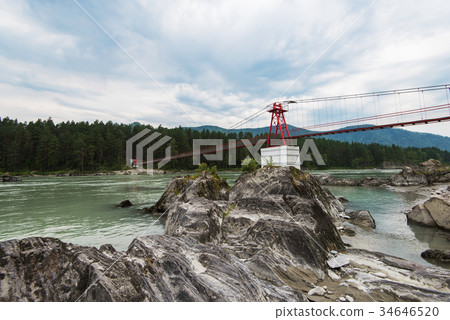 suspension bridge on mountain river suspension bridge on mountain river 34646520