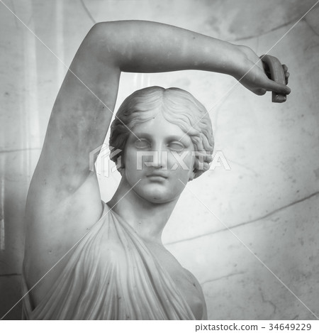 Head and shoulders detail of the ancient sculpture 34649229