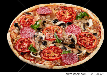 Food ingredients in pizza on black concrete Food ingredients in pizza on black concrete 34650325