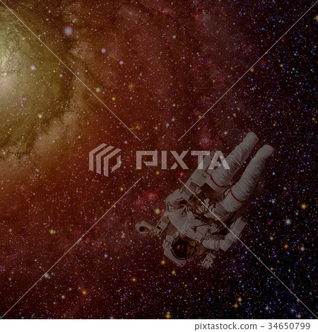 Astronaut in outer space. Nebula on the background 34650799