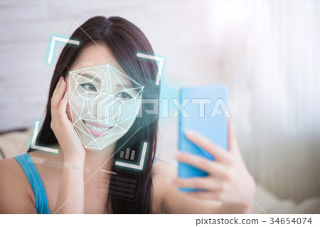 young woman is taking selfies young woman is taking selfies 34654074