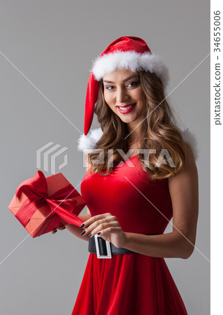 Santa Claus woman with gift 34655006