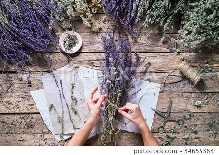 Female Hand Tie up Bunch Violet Sage Alternative 34655363