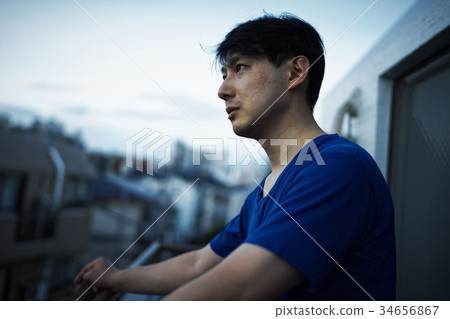 A man looking out 34656867