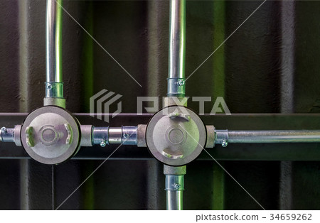 Electrical conduit work on steel beams. Electrical conduit work on steel beams. 34659262