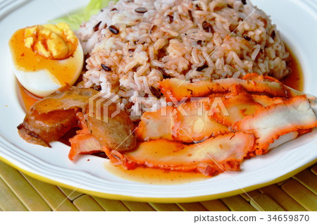 barbecued red pork dressing sweet sauce on rice 34659870