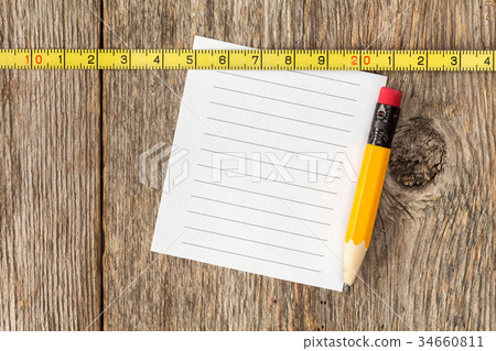 Note paper,pencil and tape measure 34660811