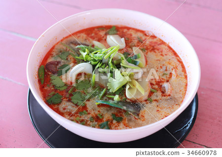 Tom Yum Goong in white bowl. 34660978