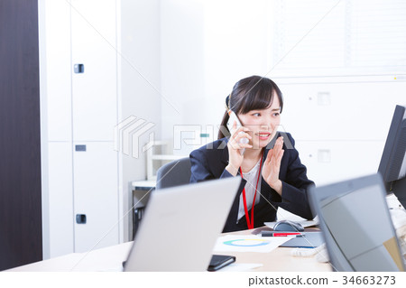 Female employee OL business man corresponding to the phone Office worker Office image Business image Female employee OL business man corresponding to the phone Office worker Office image Business image 34663273