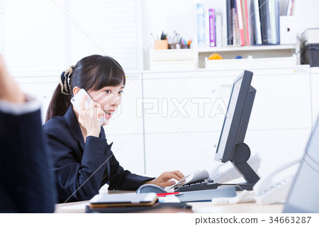 Female employee OL business man corresponding to the phone Office worker Office image Business image Female employee OL business man corresponding to the phone Office worker Office image Business image 34663287