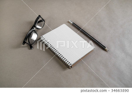 Notebook, pencil and glasses Notebook, pencil and glasses 34663890