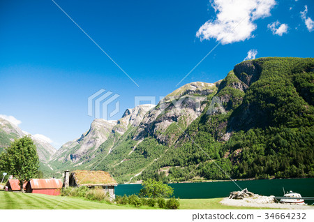 Wooden buildings by sognefjord in Norway 34664232