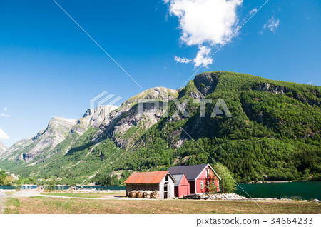 Wooden buildings by sognefjord in Norway 34664233