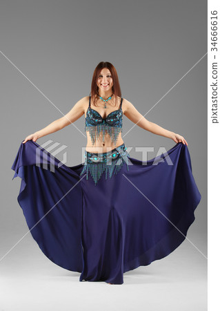 belly dancer dancing in colorful Arabic costume 34666616