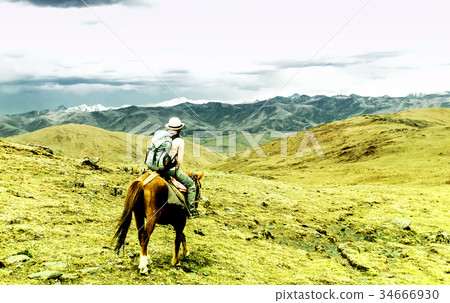 Horse trekking in tibetan highlands of China Horse trekking in tibetan highlands of China 34666930