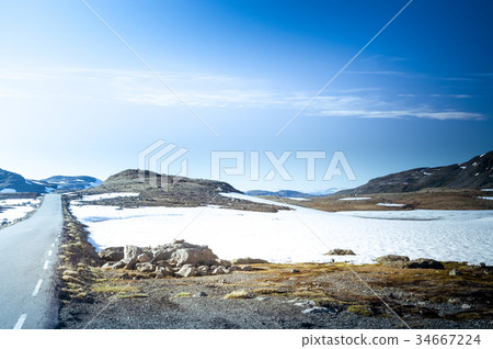 Street in the mountain landscape of norway 34667224