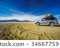 SUV in the Altiplano desert by Uyuni - Bolovia 34667759
