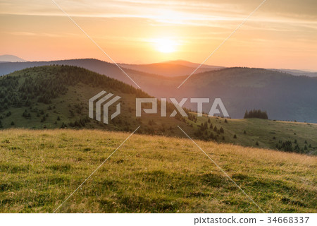 Sunset in the mountains 34668337