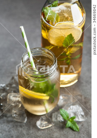 Ice tea with lemon and mint Ice tea with lemon and mint 34669842