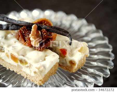 Dried fruit rare cheese cake black background (horizontal position up) 34672272