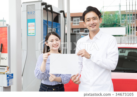 Gas station refueling self person drive car rental 34673105