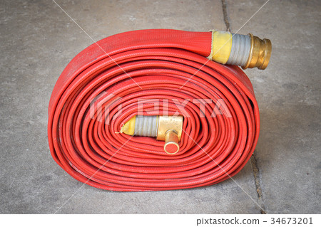 Red hose fire shabby and through use 34673201